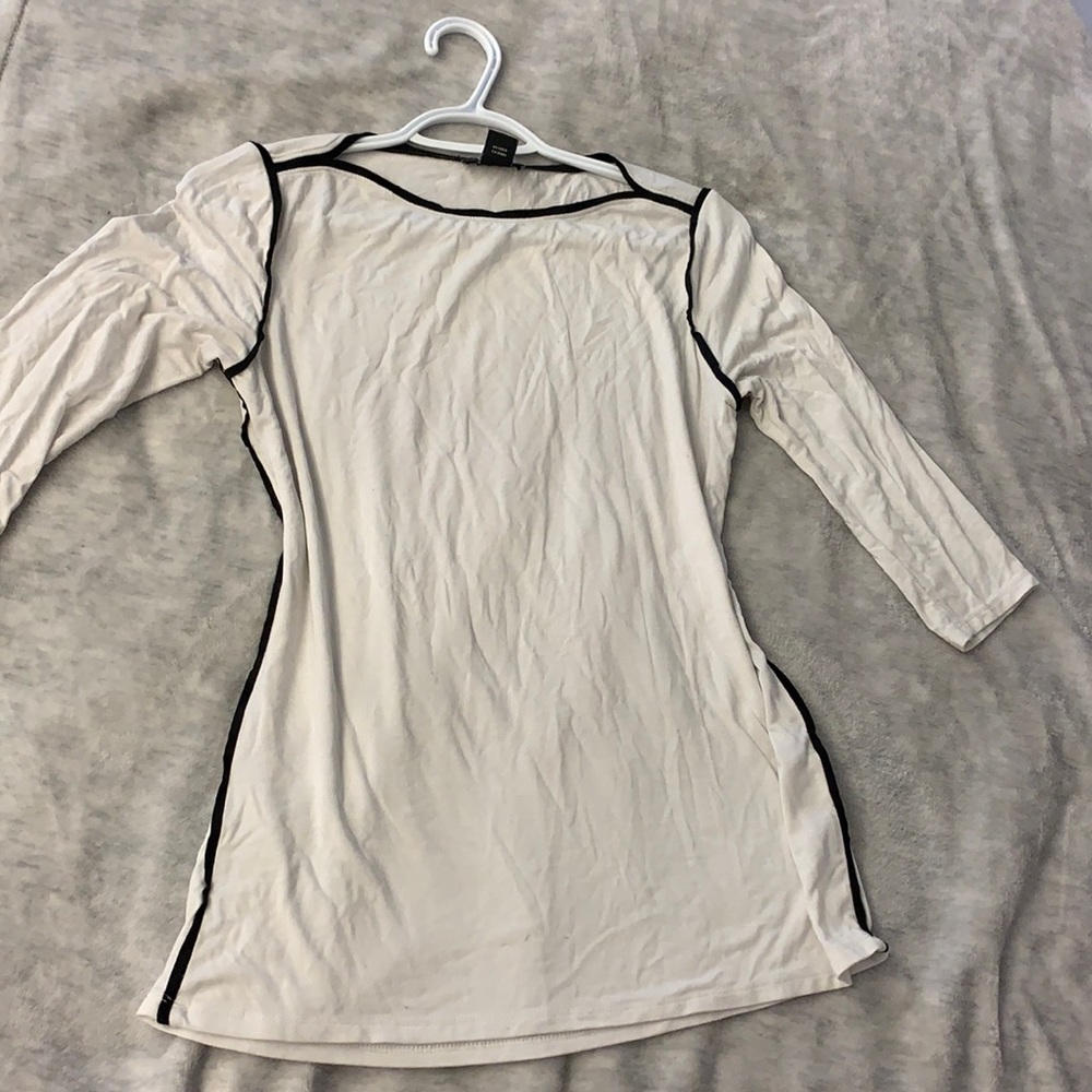 White top with black lining